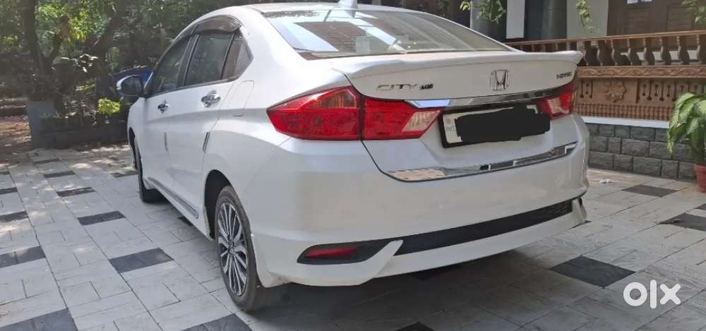 Low Km, Well Maintained And Sunroof Car