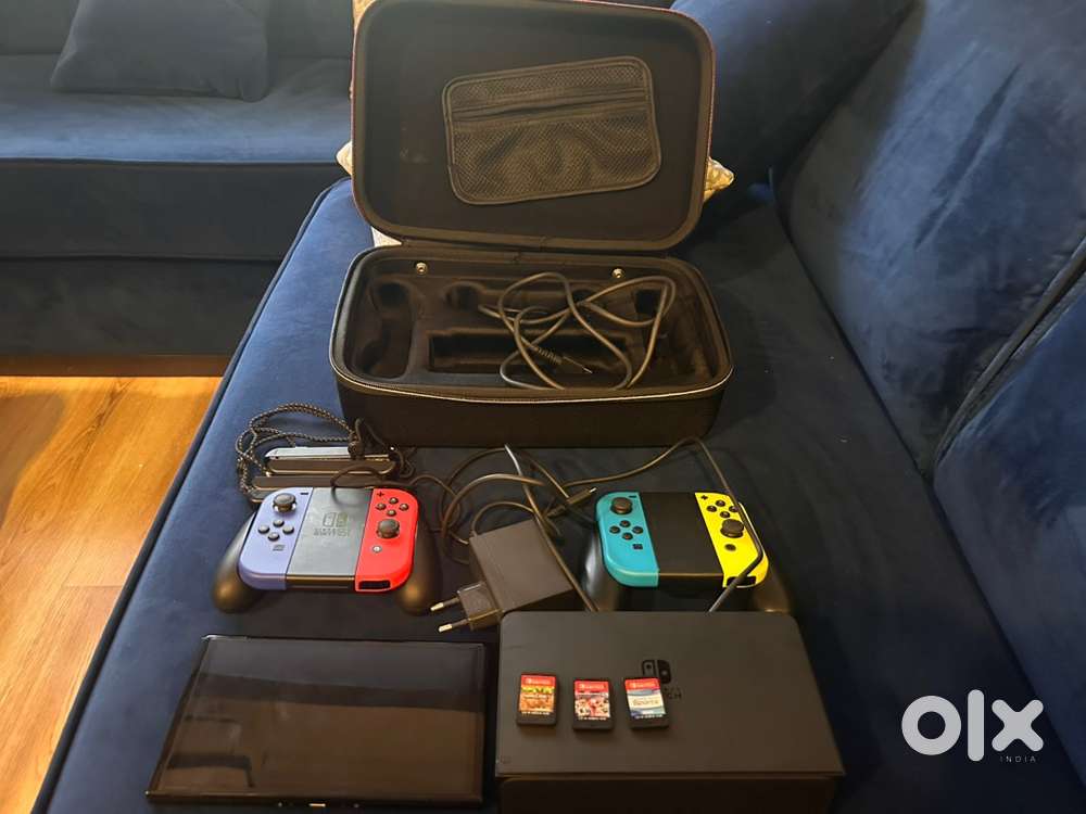 Nintendo Switch console with hames and kit bag - Games & Entertainment ...