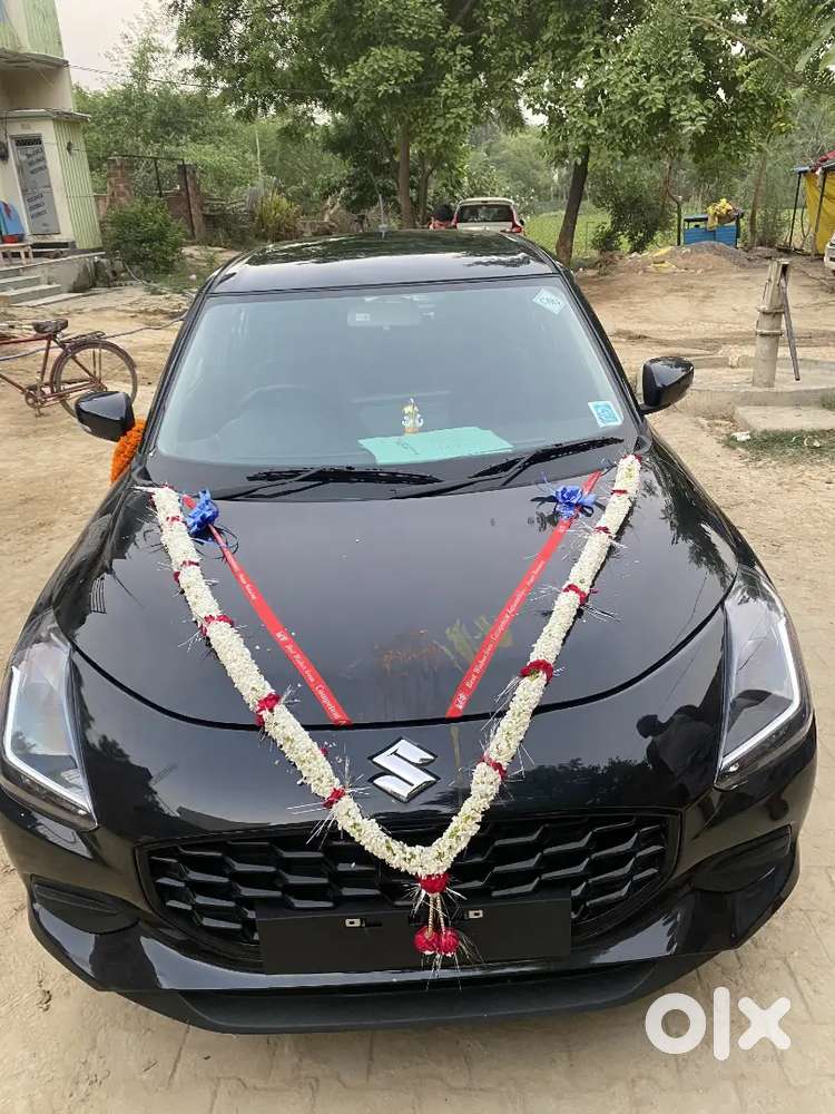 Maruti Suzuki Swift Vxi 2026