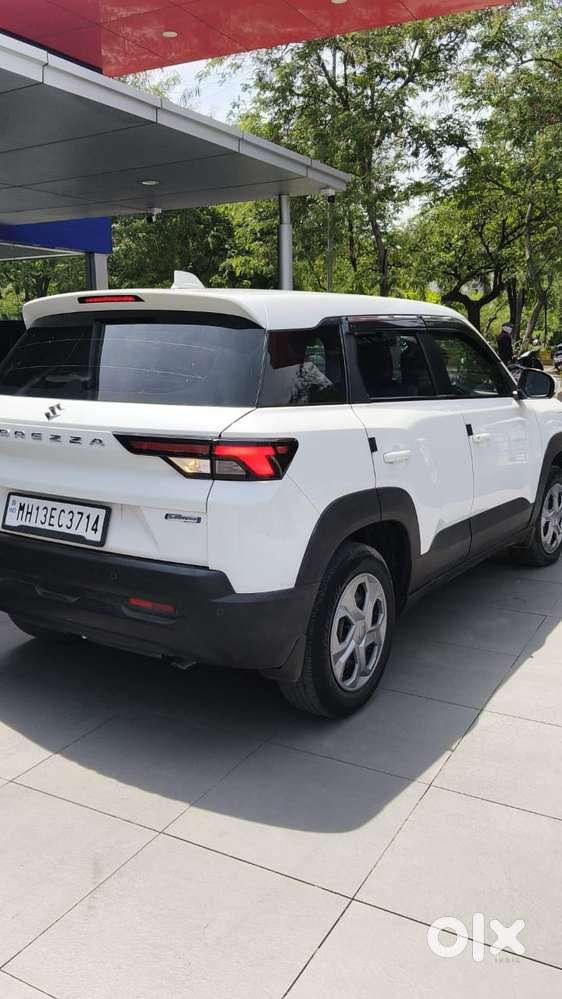 Maruti Suzuki Brezza 1.5 Lxi Smart Hybrid, 2023, Petrol
