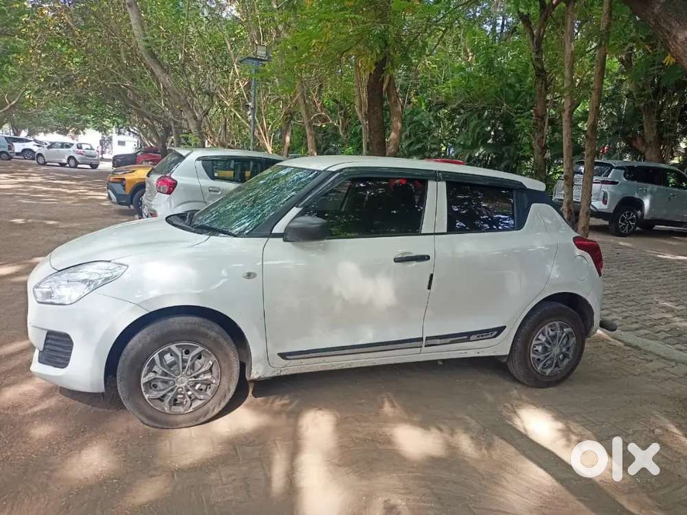 2024 Maruti Suzuki Swift Lxi  41,800 Kms Driven  Excellent Condition