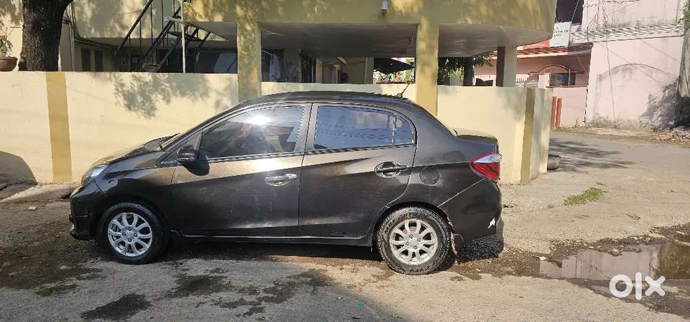Honda Amaze In Golden Brown Colour In Well Condition