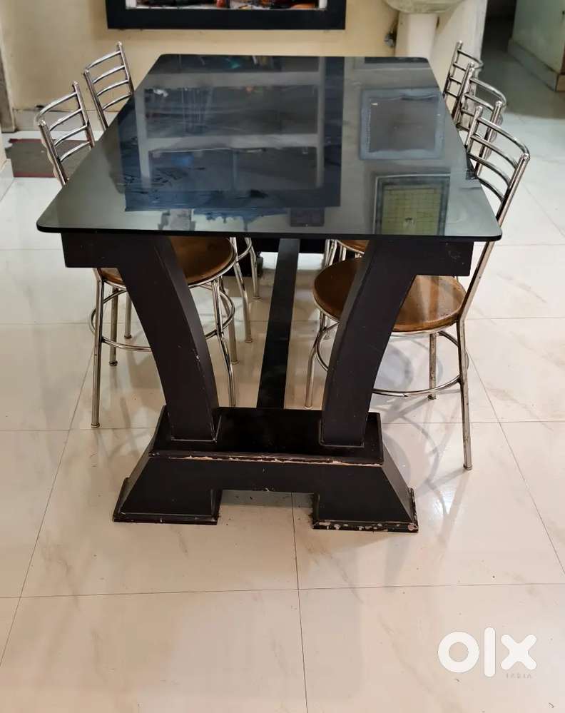 6-Seater Tinted Glass Dining Table with Stainless Steel Chairs
