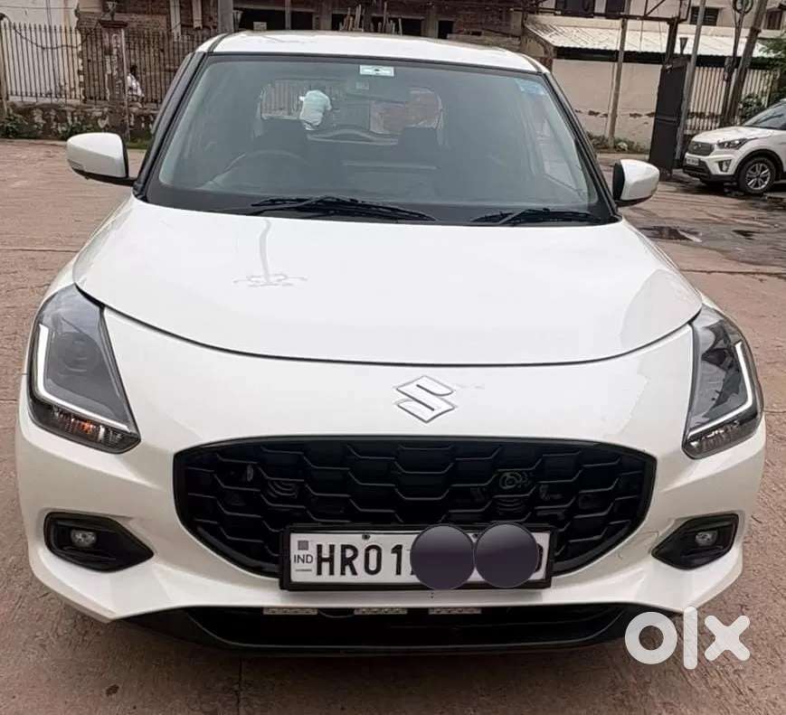 Maruti Suzuki Swift 1.2 Vxi (o), 2024, Petrol