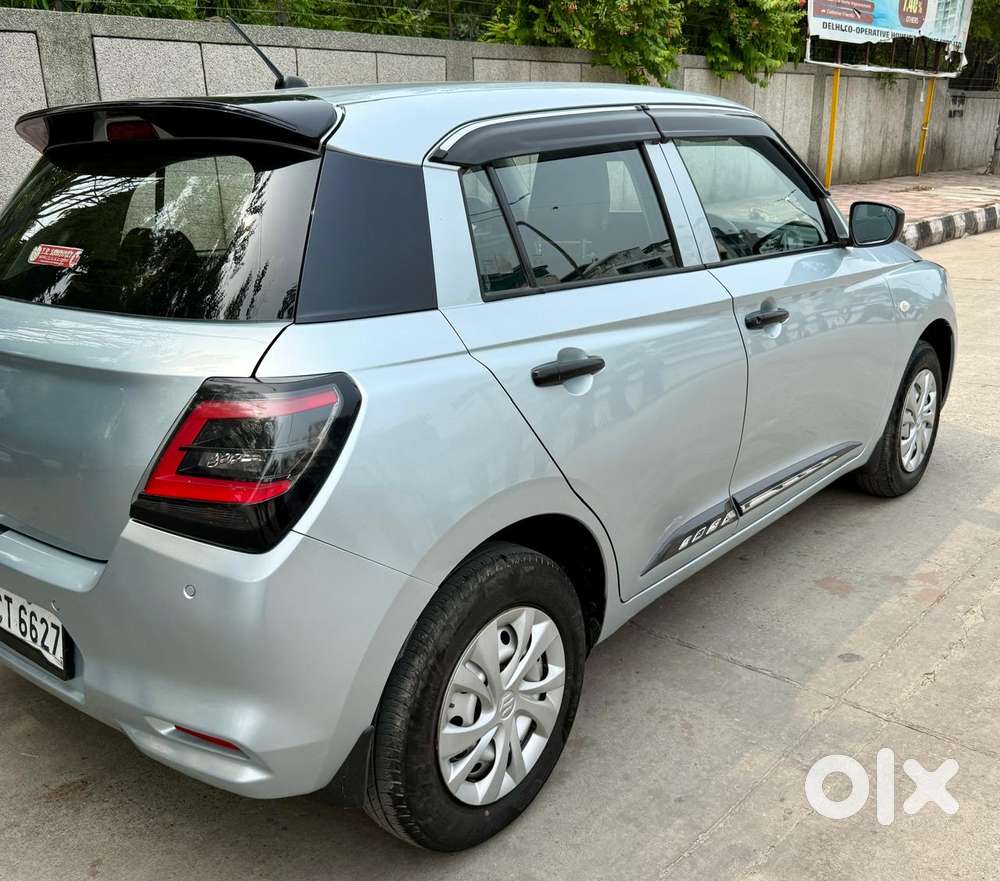Maruti Suzuki Swift Lxi Optional-o, 2024, Petrol