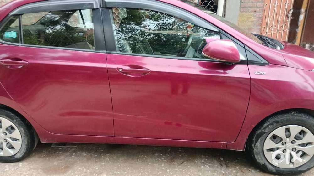 Xcent Maroon Color
