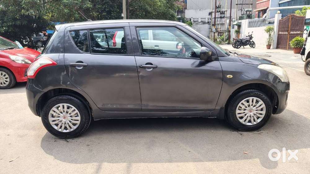 Maruti Suzuki Swift Lxi Optional-o, 2015, Petrol