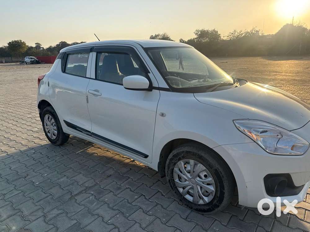 Maruti Suzuki Swift 1.2 Lxi (o), 2023, Petrol