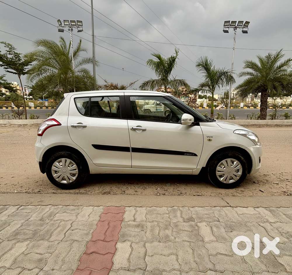 Maruti Suzuki Swift 1.2 Lxi (o), 2014, Petrol