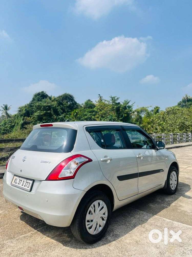 Maruti Suzuki Swift Lxi Optional-o, 2016, Petrol