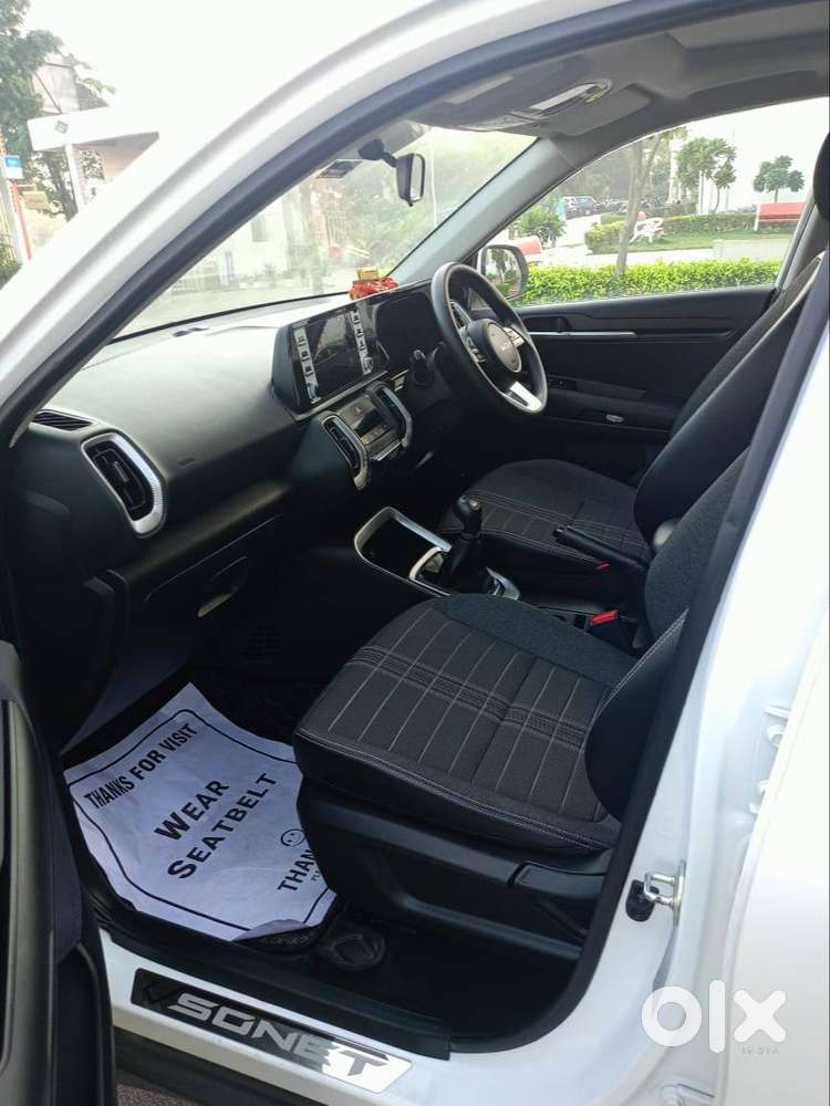 One Year Old White Kia Sonet In Excellent Condition For Sell