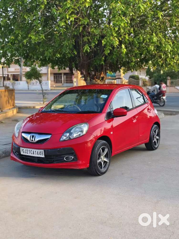 Honda Brio Sporty Look 
 Magwiil Spot Tire Center Lock