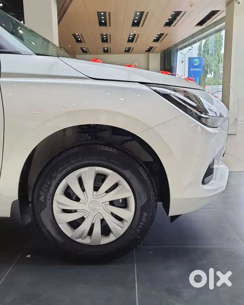 Maruti Suzuki Swift Vxi 2026