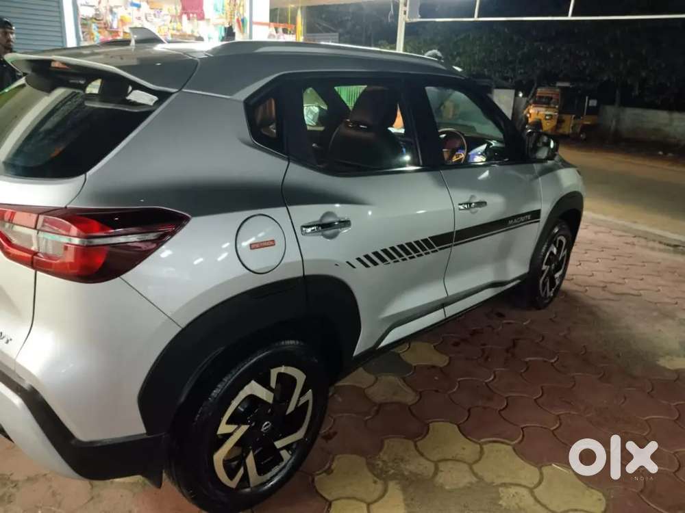 Lady Used Nissan Magnite 2023 Petrol 25000 Km Driven
