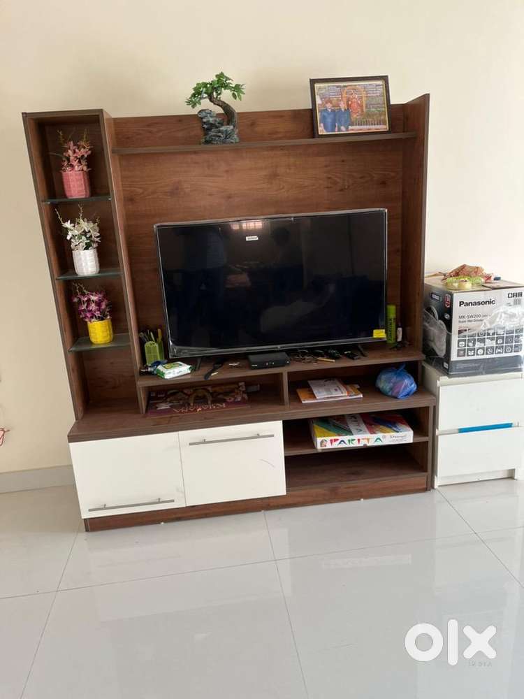 Second hand tv stand olx discount