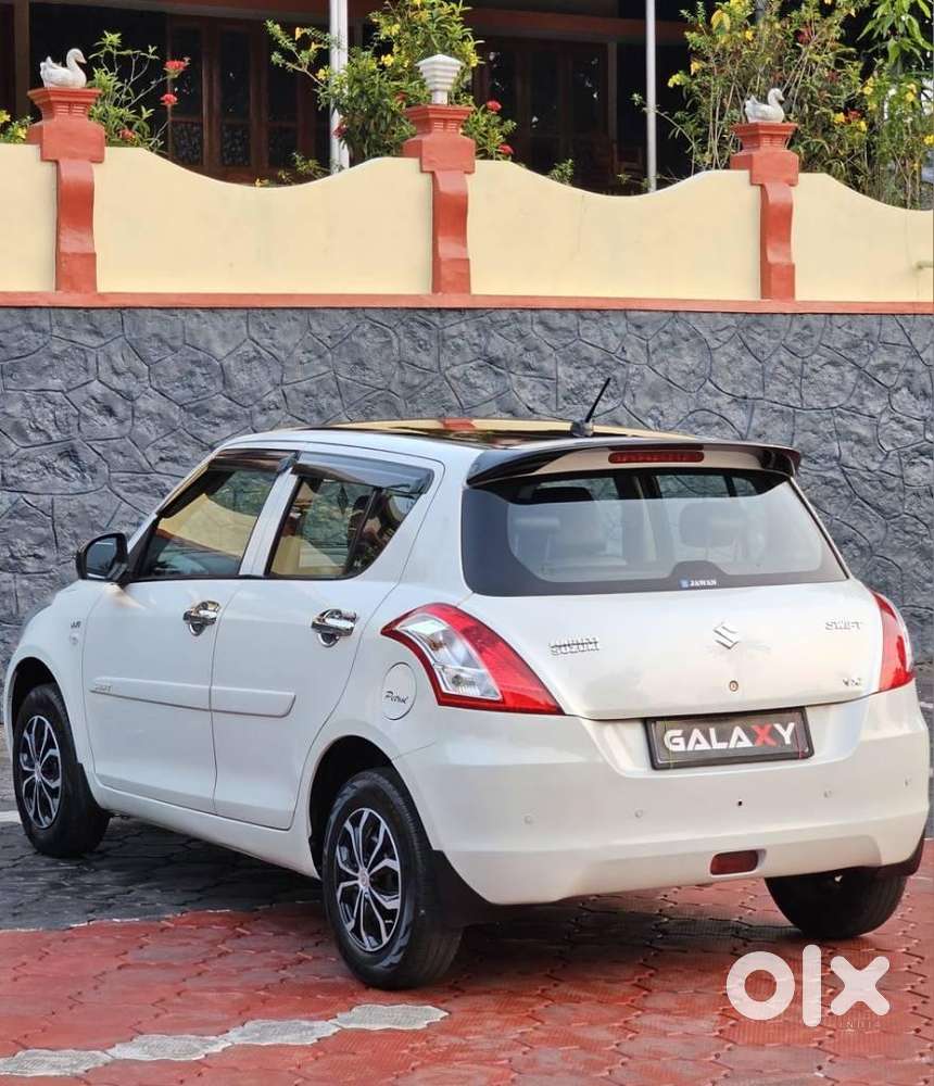 Maruti Suzuki Swift 1.2 Lxi (o), 2015, Petrol