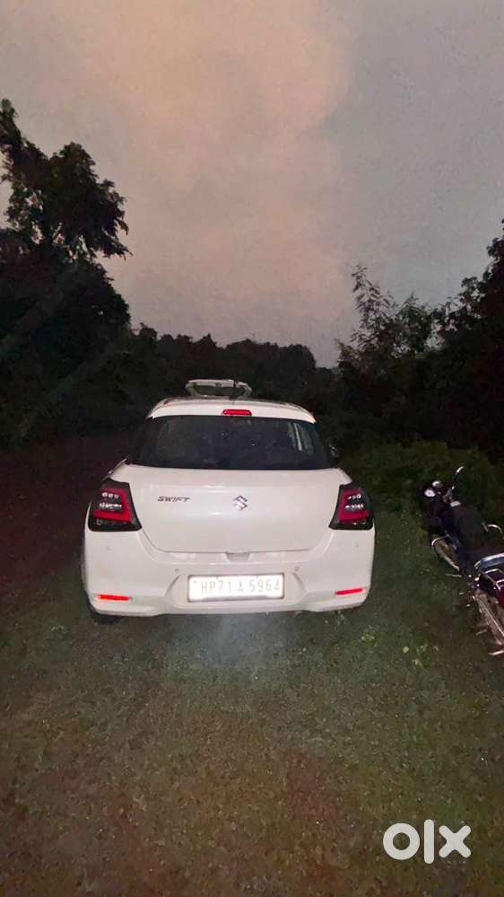 Maruti Swift Vxi Optional 2024