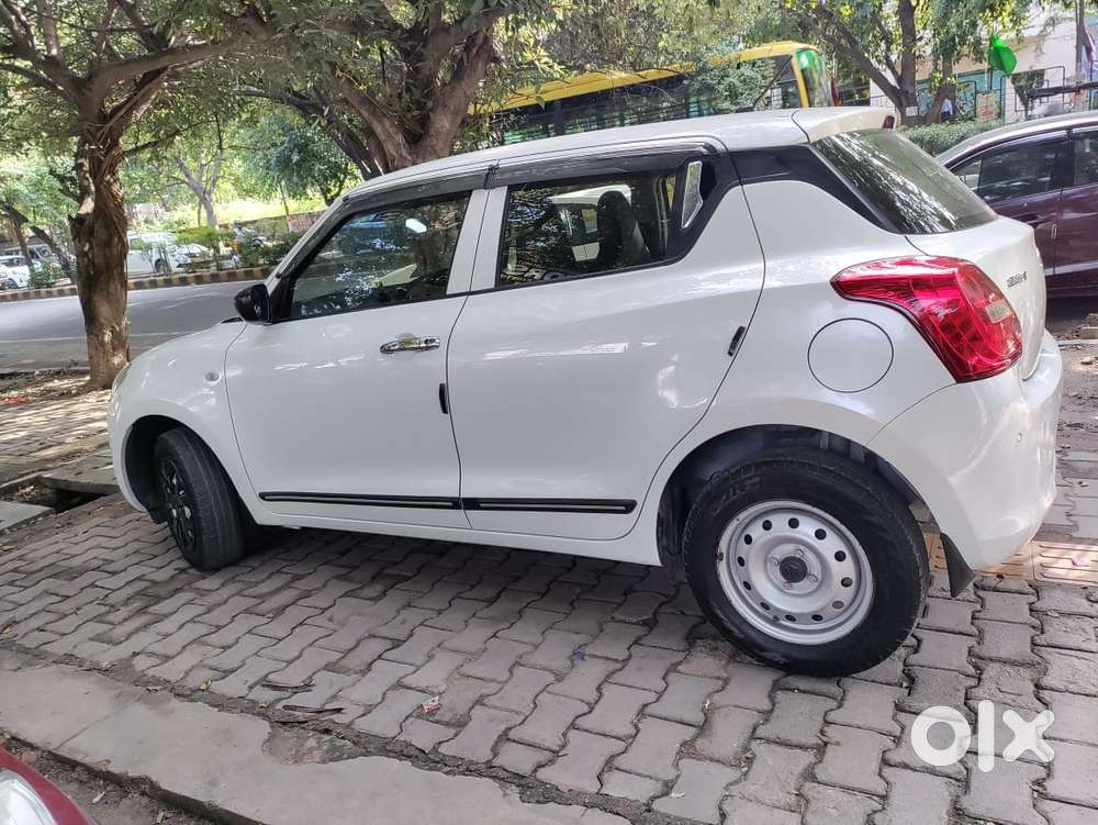 Maruti Suzuki Swift 1.2 Lxi (o), 2022, Petrol