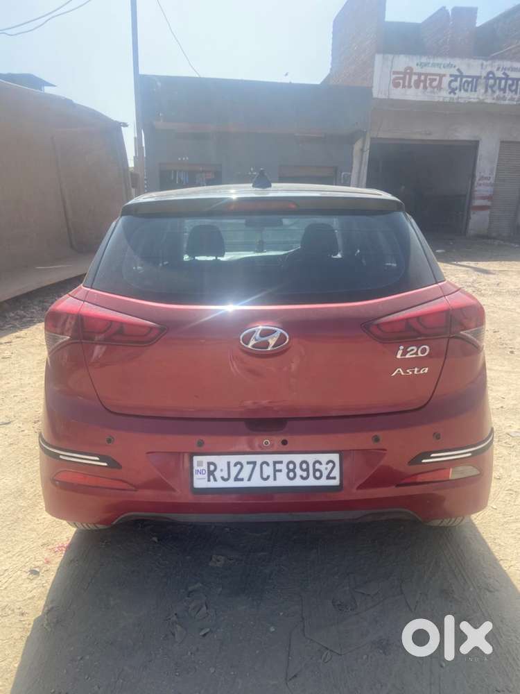 Red Colour , Well Maintained, Insurance Valid Till Mar-27,