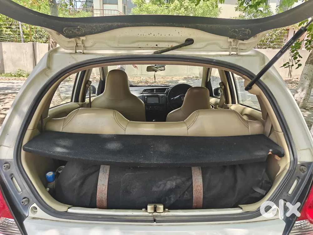 White Honda Brio 2017 With Sequential Cng On Paper In Good Condition.