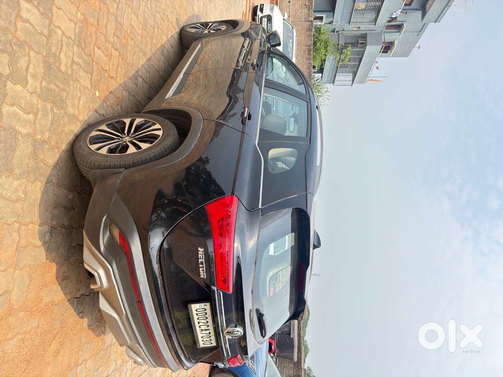 Mg Hector Hybrid Top Variant Less Driven