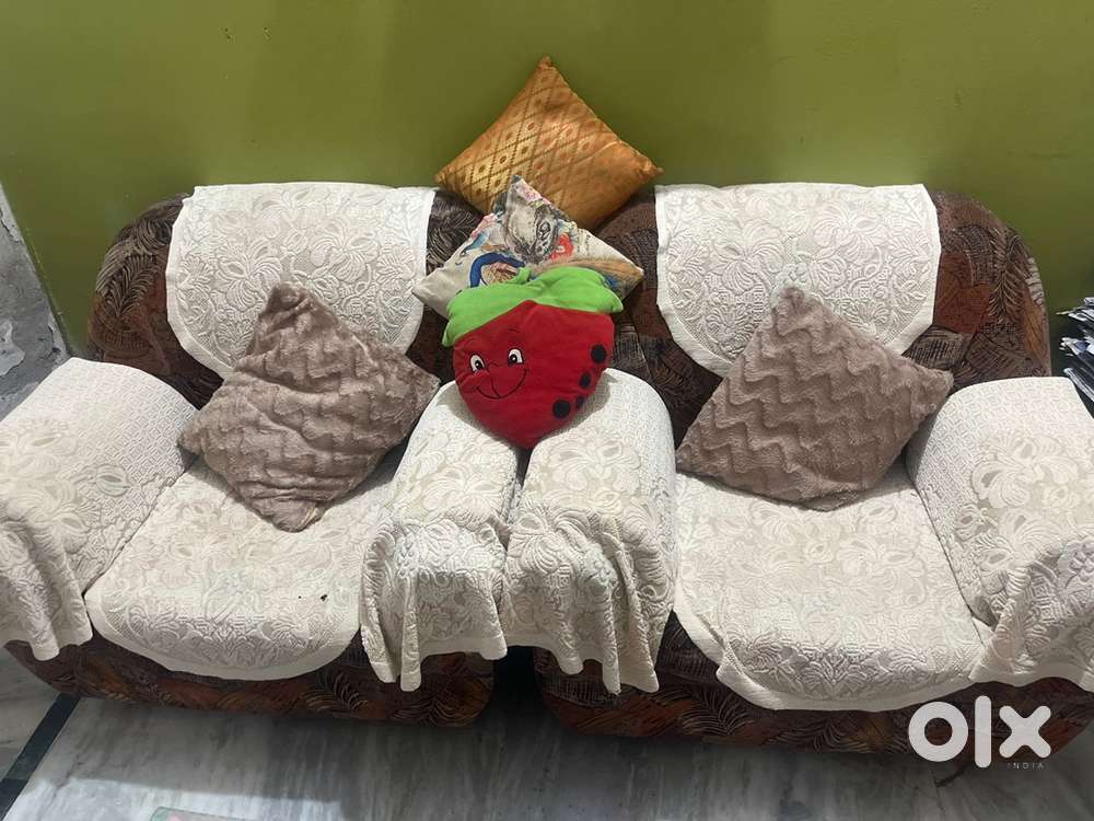 5 seater Sofa with glass table