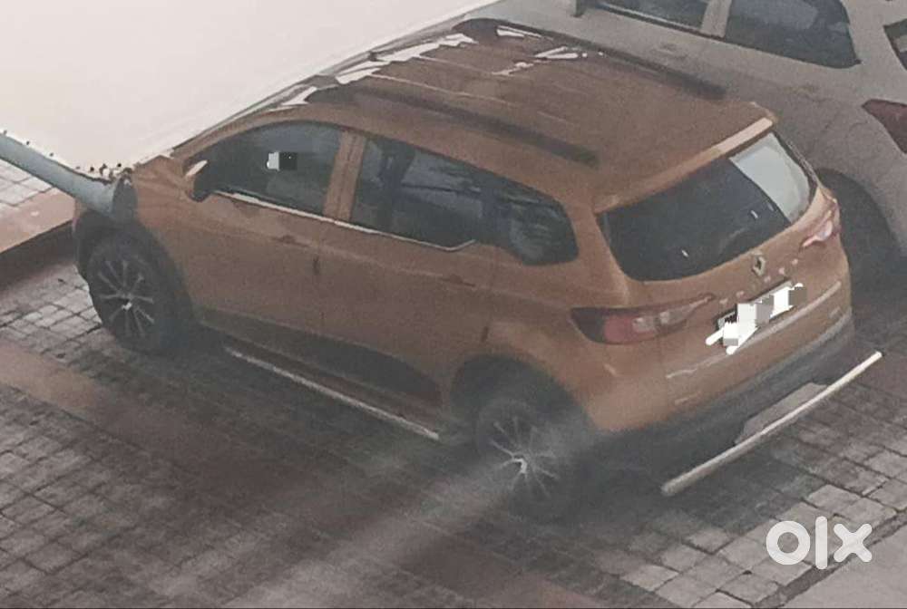 Mustard Colour Renault Triber With 15inch Alloy Wheels