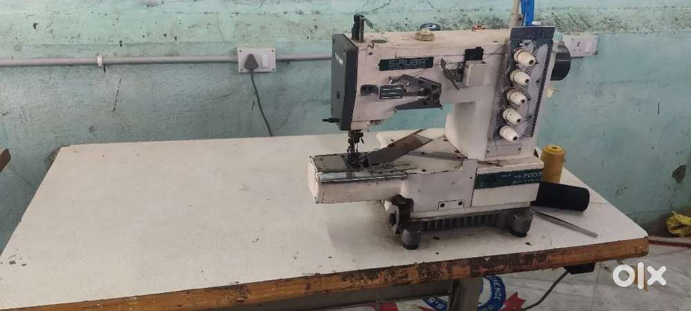Bat lock machine over lock machine
