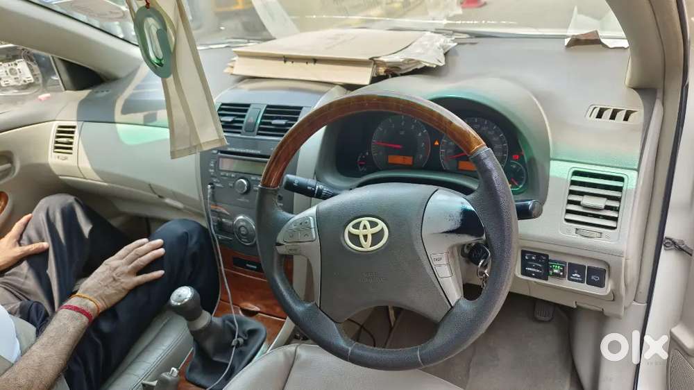 Corolla Altis 2010 , Less Driven Petrol+ Cng