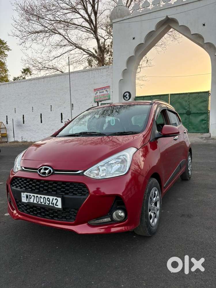 2018 Hyundai Grand I10 Red   First Owner  56,399 Km  ₹3,60,000