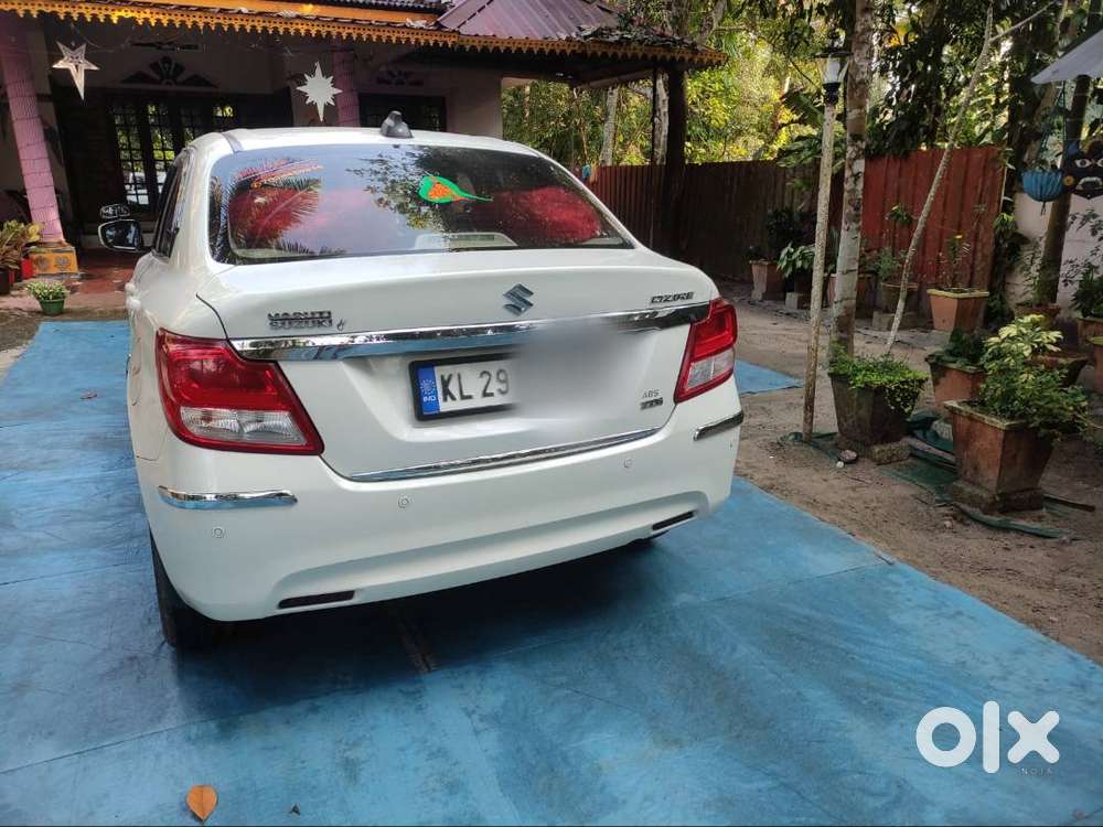 Dzire Zxi With Star Stop Button And Alloy Wheels And Keyless Entry