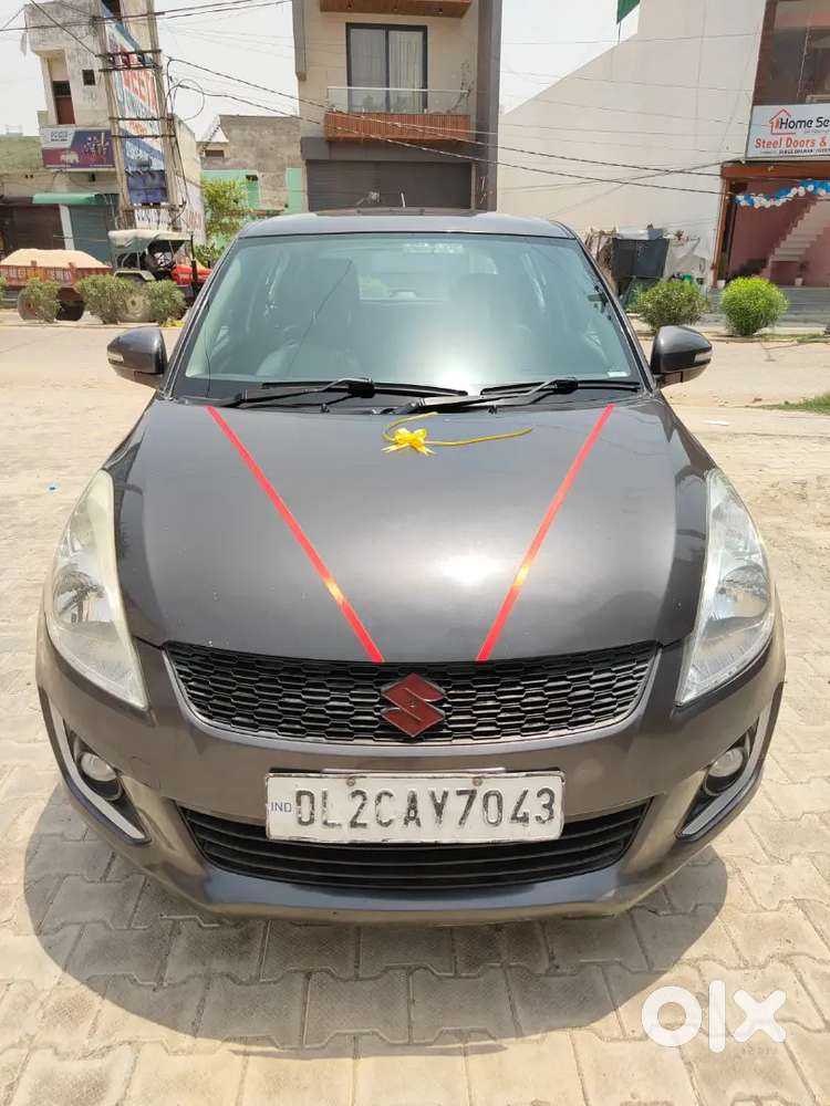 Maruti Suzuki Swift Lxi 2016
