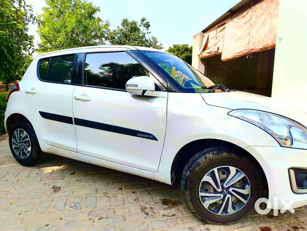 “maruti Suzuki Swift Vxi 2015 White  40k Driven  Insurance Valid”
