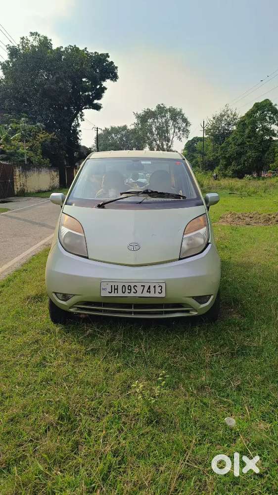 Tata Nano Lx 2012 Magenta Green Colour