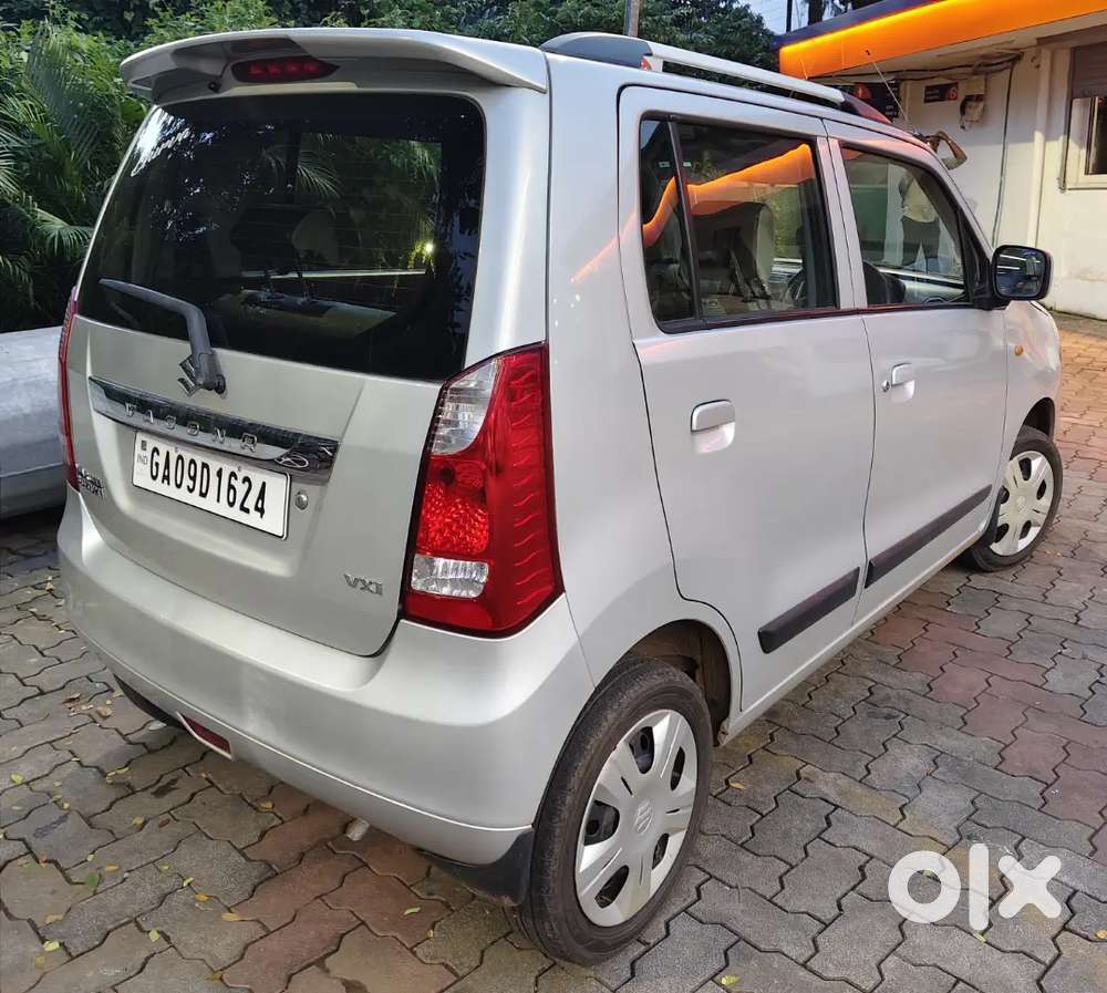 Wagon R Vxi 2016 June, Silver, Car In Showroom Condition.