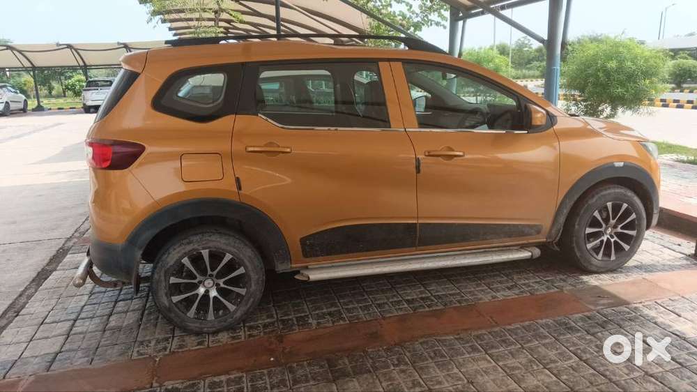 Mustard Colour Renault Triber With 15inch Alloy Wheels