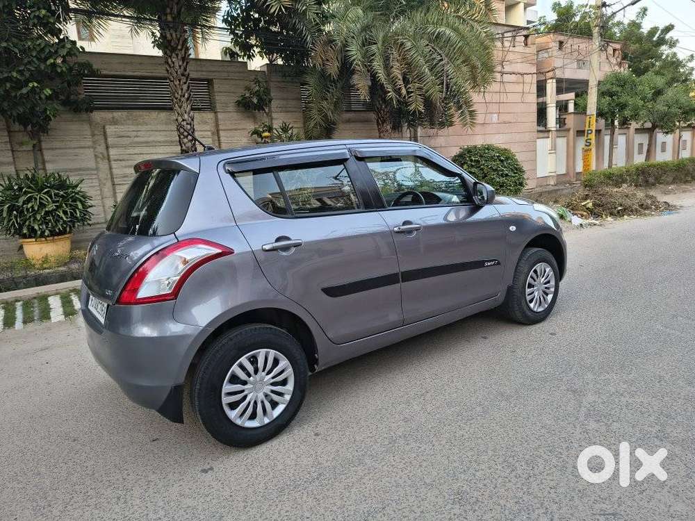 Maruti Suzuki Swift Lxi Optional-o, 2015, Petrol