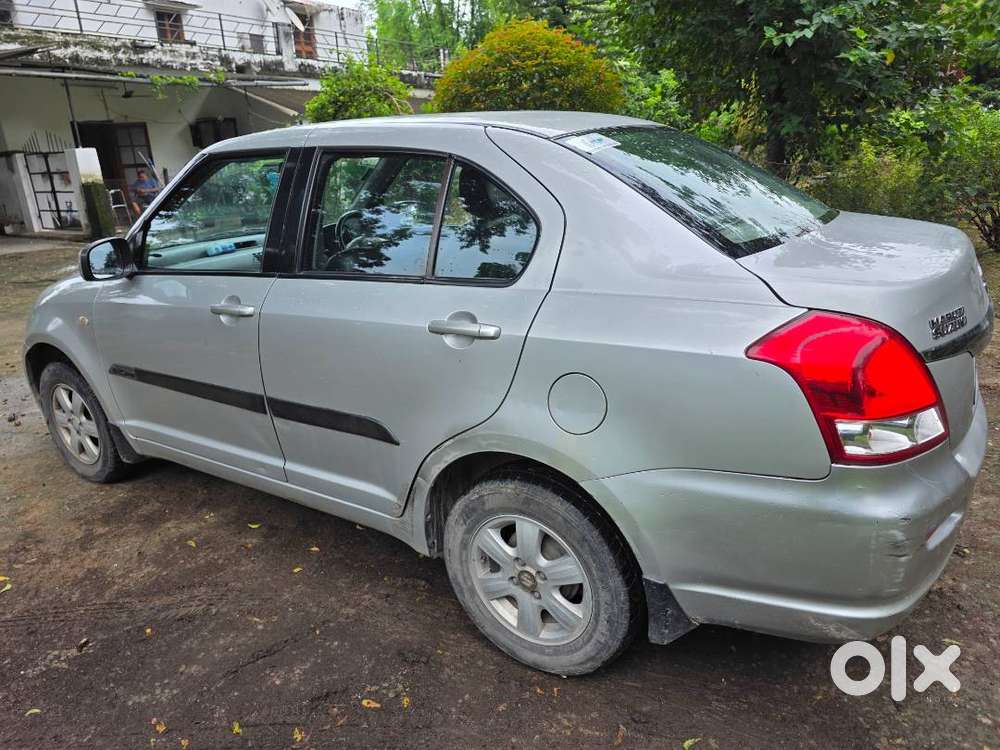 Maruti Suzuki Dzire-2010-first Owner-silky Silver