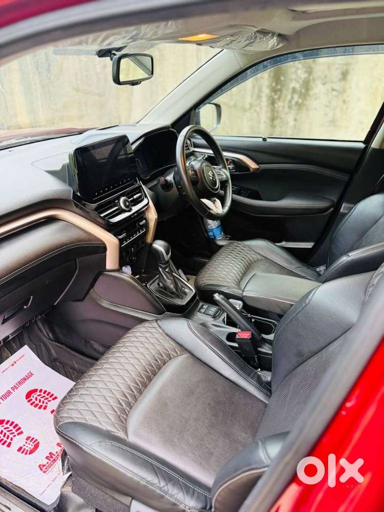 Maruti Suzuki Grand Vitara 1.5 Zeta Plus Dual Tone Intelligent Hybri..