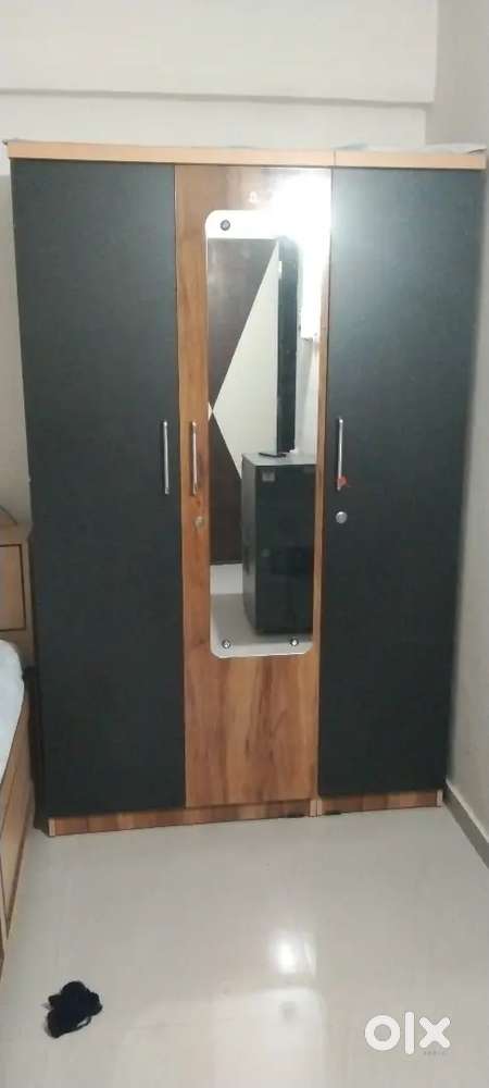 3 doors wooden cupboard with mirror for sell