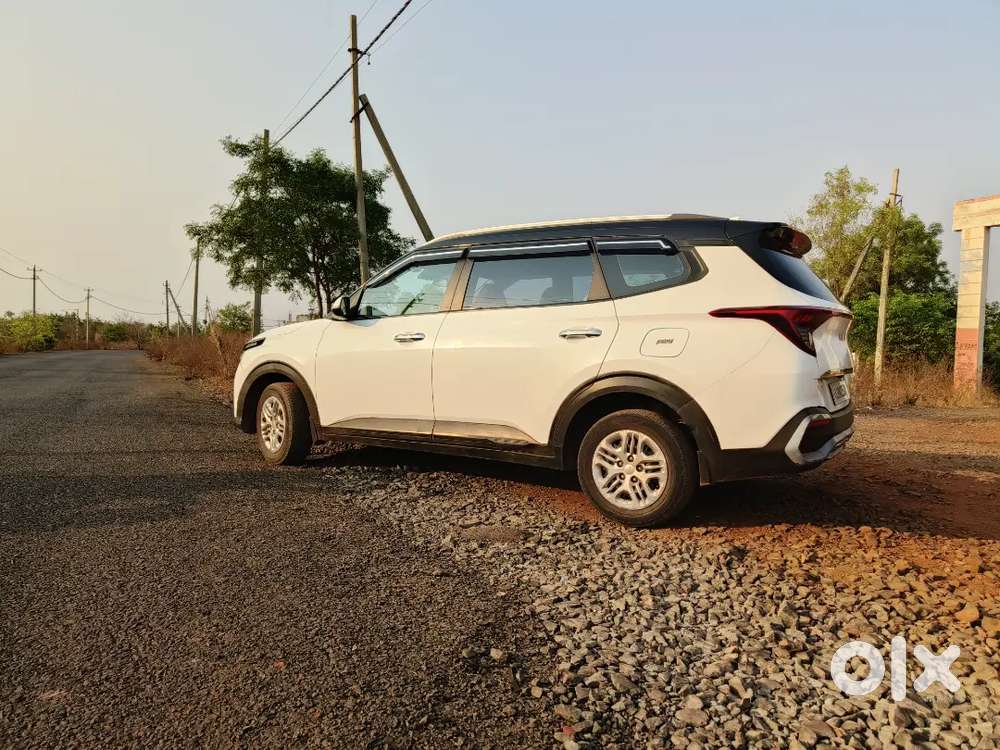 Kia Carens Prestige Glacier White 1st Owner 9.9 Lakh Only Fixed