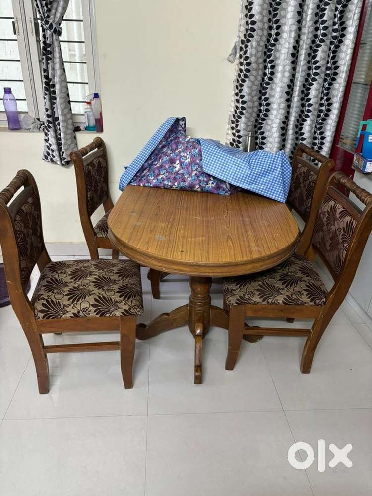 Teak wood sofa and teak wood dining table n four chairs 1754798399