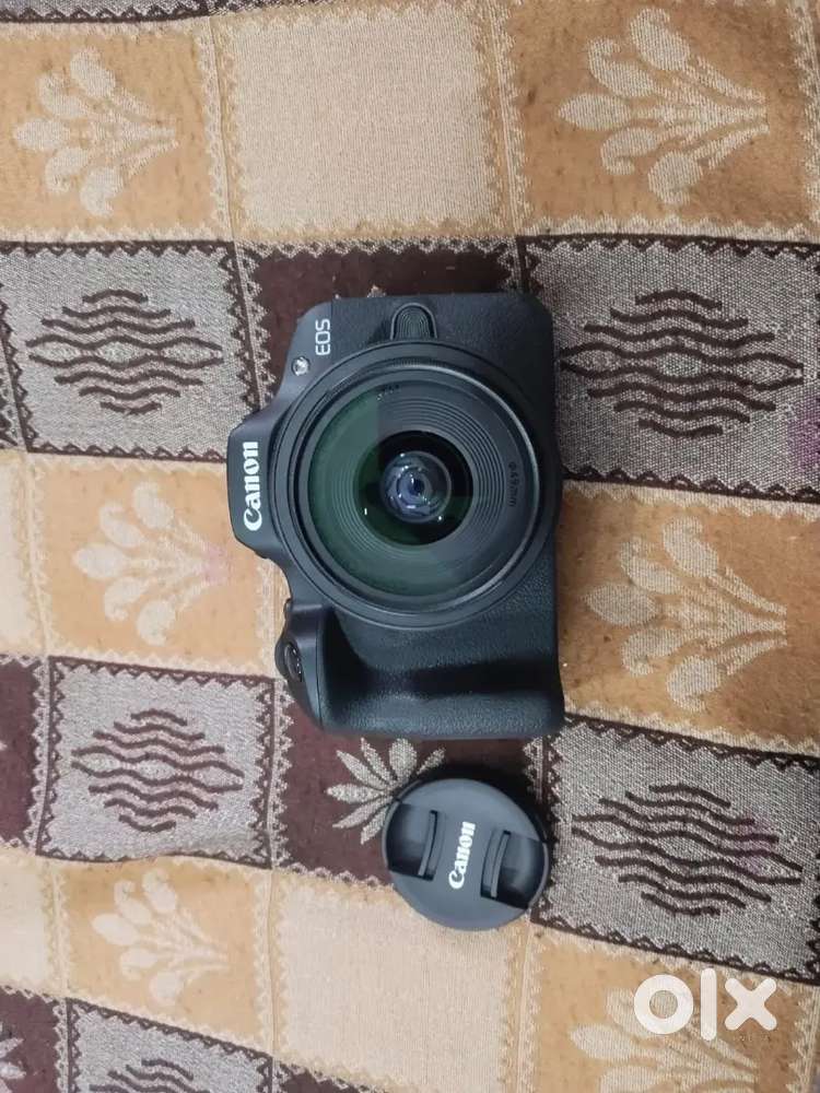 Canon Digital Camera EOS rx100 brand new.With all accessories