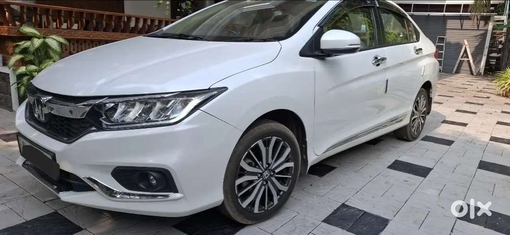 Low Km, Well Maintained And Sunroof Car