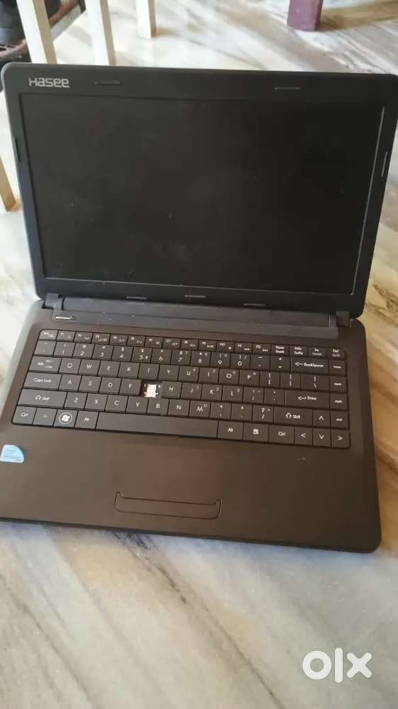 HASEE NOTEBOOK FOR SALE NOT WORKING ONLY FOR SPARE PARTS