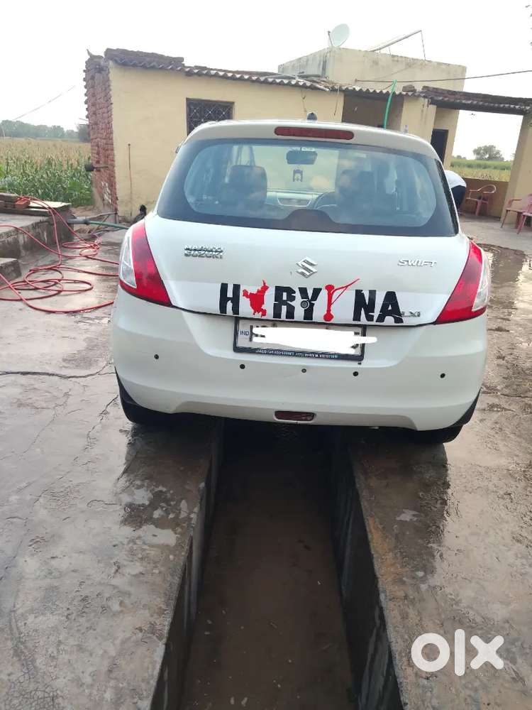 Maruti Suzuki Swift Lxi 2016