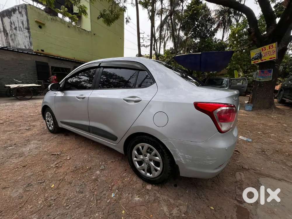 Hyundai Xcent 2014 Tax 2029