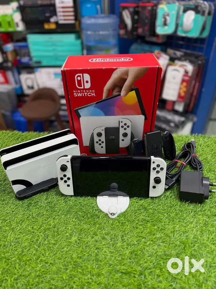 Nintendo Switch OLED Handheld Gaming - Games & Entertainment in
