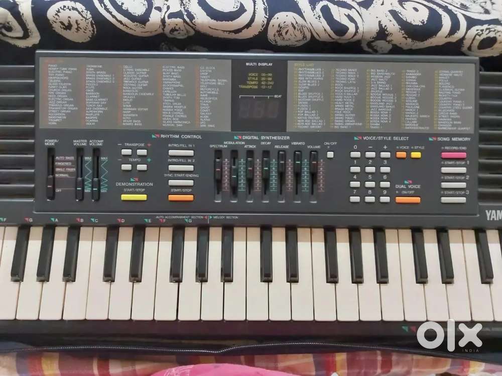 The Yamaha PortaSound PSS-390 Piano or Keyboard - Musical