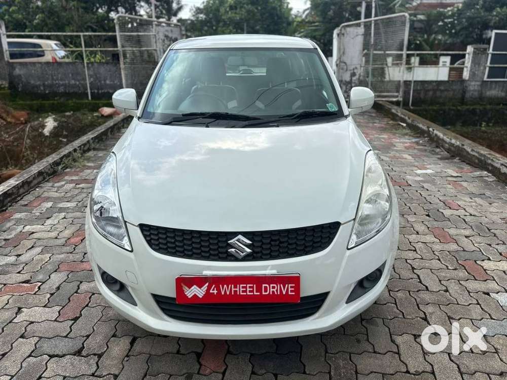 Maruti Suzuki Swift Lxi Optional-o, 2013
